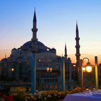 	Dining with the Blue Mosque as background. Istambul.