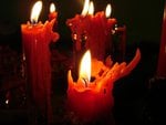 Red Candles Burning Through Night .jpg