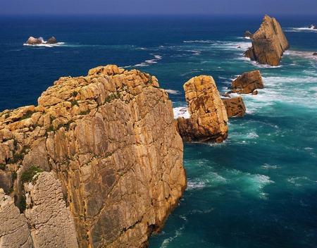 Rocks Queued Coast - hills, foam, coast, blue, amazing, landscape, wawes, fabulous, nice, beautiful, photography, queued, sea, cool, ocean, wonderful, awesome, mountains, rocks