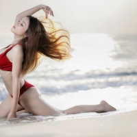 Asian Beauty Posing in a Red Bikini