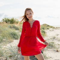 Rosalind at the Beach in a Red Dress