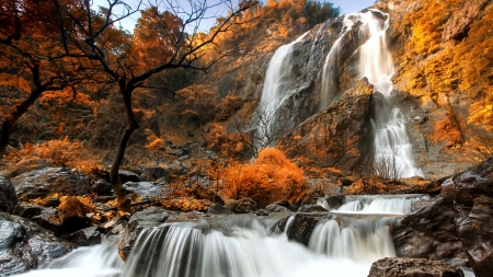 Waterfall in autumn forest