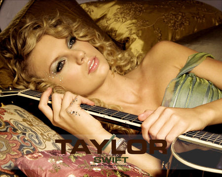 Taylor Swift: Teardrops on my guitar - artist, love, country singer, girl, guitar, female, music, singer, taylor swift, country, long blonde curly hair, pretty blue eyes, songs, green dress, fearless