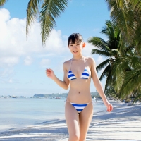 Bikini Model on a White Sand Beach