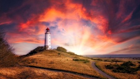 Colorful sky and clouds above the Dornbusch lighthouse 