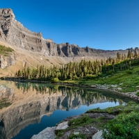 Morning reflections at Iceberg Lake, Glacier National Park