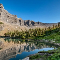 Morning reflections at Iceberg Lake, Glacier National Park, Montana