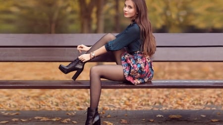 Ariadna Majewska - black hose, flower pattern, tieing boot lace, jewelry, long, grey  blue shirt, brunette, mini skirt, park bench