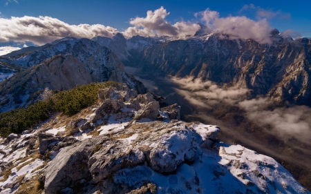 Slovenian Julian Alps in the late autumn - clouds, trees, sky, rocks