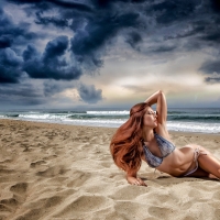 Bikini Model with Stormy Sky