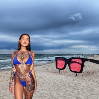 Bikini/Inked Model on Strand Beach