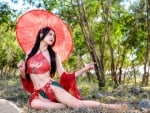 Asian Beauty Posing with an Umbrella