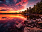 Dramatic lake landscape with vibrant sunset