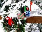 Snowy Mailbox full of presents 