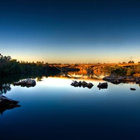 Sunrise over water, blue light sunrise on lake