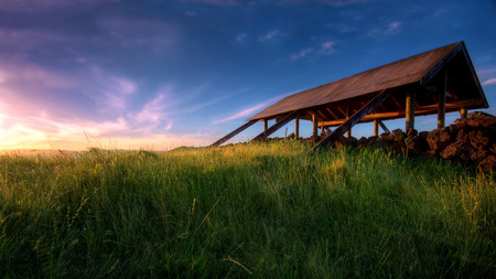 sunlight on gress - clouds, house, sunlight, rock, grass, sunlight on gress, sunset, hut, sky