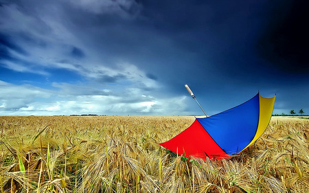 Blue Sky - yellow, blue, amazing, splendor, landscape, blue sky, umbrella, view, red, nice, sky, storm, clouds, beautiful, stormy, beauty, colors, lovely, colorful, nature, peaceful