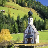 A small church in valley of mountains