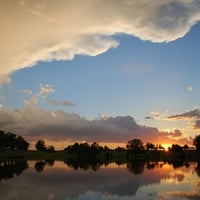 Rising Sun on Lake Mirror