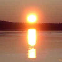 Icy sunrise reflection