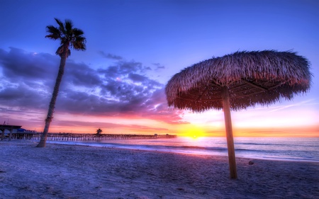 Straw Umbrella By The Beach - california, ocean, beach, colorful, sunset, san clemente, shade, bright, house, tree, sand