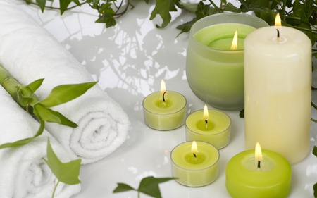 relaxing time - wellness, candle, candles, feng shui, enjoy, relaxing, white, towel, leaves, green, spa, towels, bamboo, lights, happy