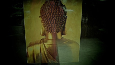 just behind wisdom - golden, muted, buddha