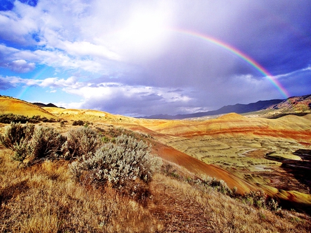 Rainbow Over Fossil Beds- Oregon - oregon, hills, sky, rainbow, bright, clouds, fossil, nature, colorful