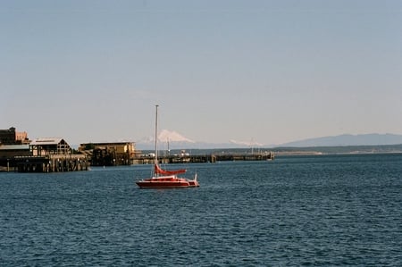 Sailboat in front of Mt. Rainer - hills, sailboat, red, boat, ocean, dock, mt rainer, mountain