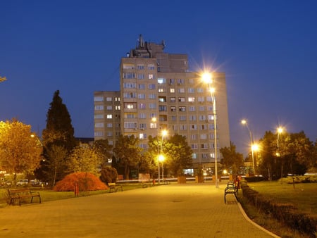 Beautiful Town - sky, trees, bench, modern, romania, lanterns, walk, architecture, tree, grass, building, night, nature, town, alley, city, lights