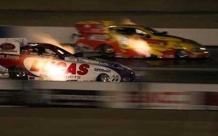 Funny Cars at Night - speed, funny car, fire, flame, photo, race car, race track, drag race