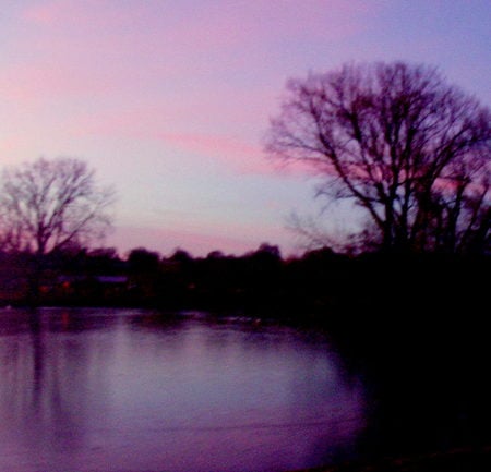 sunset at wicksteed park. - train, sky, lake, purple, trees, park, photo