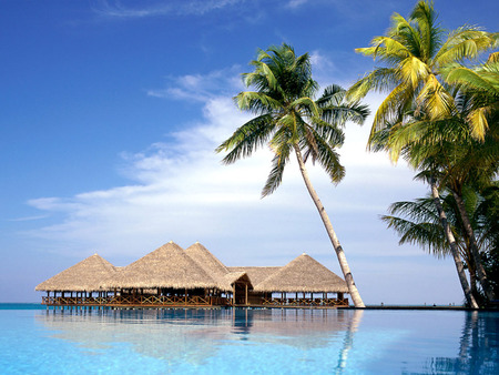 Entertainment center - beaches, ocean, beach, sky, maldives, trees, water, wet, huts, nature, picture, cool, clouds, blue, sea, resort