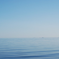 The boat tells the difference between sky and ocean