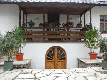 A house in a monastery - flowers, house, religious