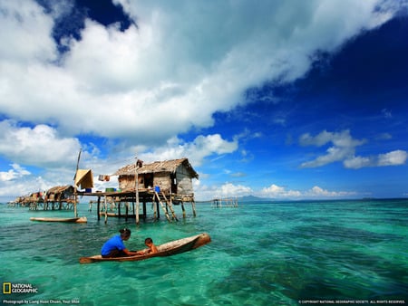 Sea Huts - mother and son, fishing