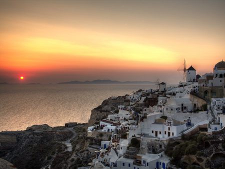 Oia sunset - hill, houses, ocean, mountain, sun, sunset, greece, santorini, beautiful, orange, windmill, sea