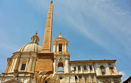 Up to the sky II - obelisk, church, roofs, sky