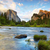 Flowing River Between Mountains