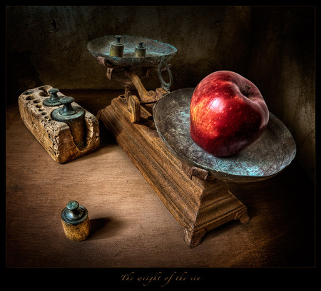 STILL LIFE - balance, weights, scale, red apple