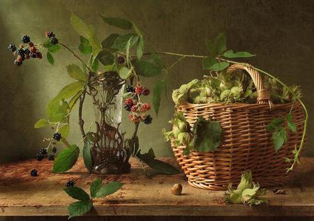 STILL LIFE - basket filled with hazelnuts, brambles, blackberries, summer