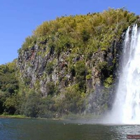 mountains  by lake with waterfall