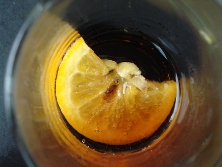 at the bottom of the glass - citrus, center, lemon, glass