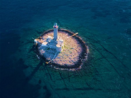 Lighthouse in Blue - lonely, lighthouse, reef, sea, ocean, light