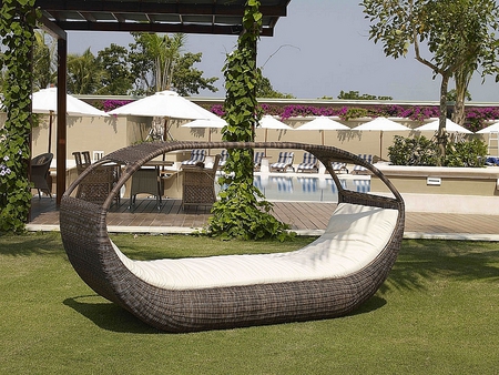 Unique style - wicker, comfort, sunny, vines, daybed, relaxing, lounges, grass, reflection, bed, pool, yard, umbrellas