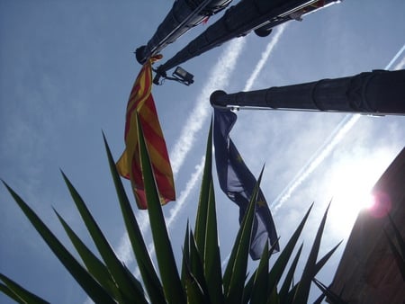 Flags in blue sky - sky, flag, blue, sun