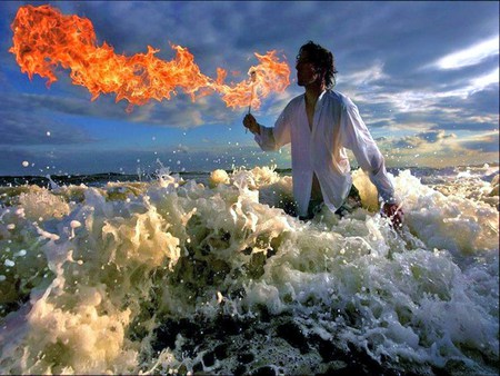 Fire and water - fire, water, ocean, waves, man