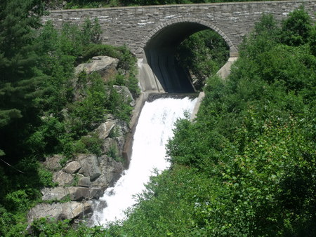 The Rush - water, bridge, trees, rocks