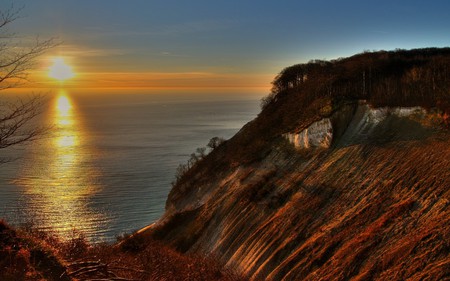 SUNRISE FROM A ROCK OF CHALK - rock, mountains, water, chalk, sunrise