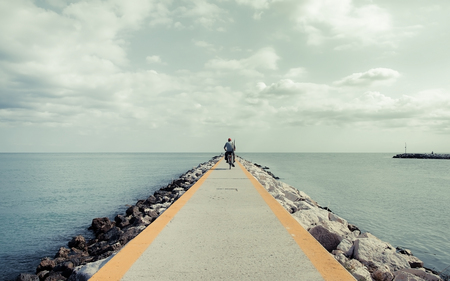 fresh day - ocean, pier, people, bike, fisherman, bicycle, breaker, stones